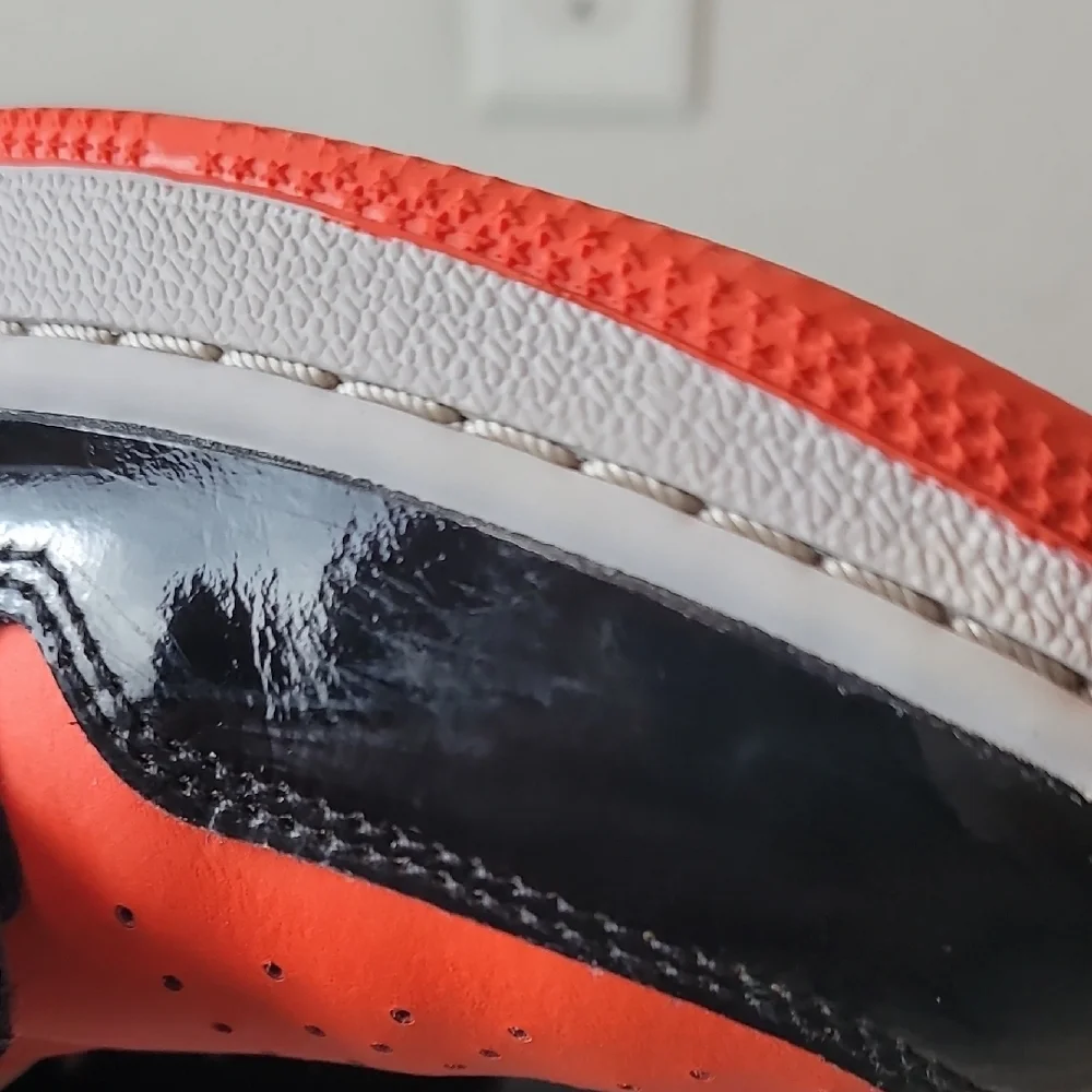 Air Jordan 1 Low Kids Black and Orange Sneakers
